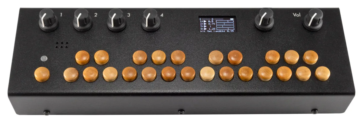 Organelle S2 in black, seen from above, with four knobs, a small OLED screen, a volume knob and a keyboard of maple keys