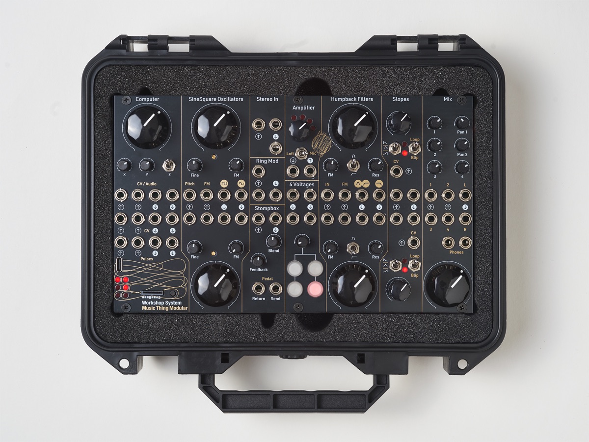 Music Thing Modular Workshop System in its case, seen from above, with the Workshop Computer module at the left of the panel