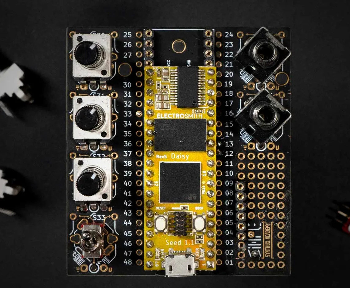 Top-down view of the Simple Fix board with a Daisy Seed, three knobs and two jacks fitted